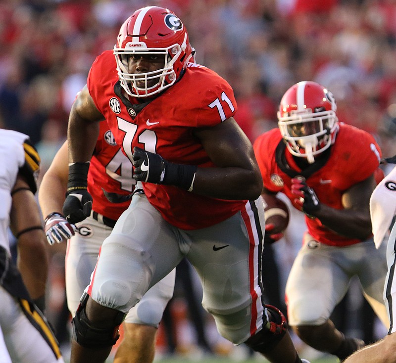 Georgia freshman right tackle Andrew Thomas helps clear a path for Sony Michel during the season-opening win over Appalachian State.