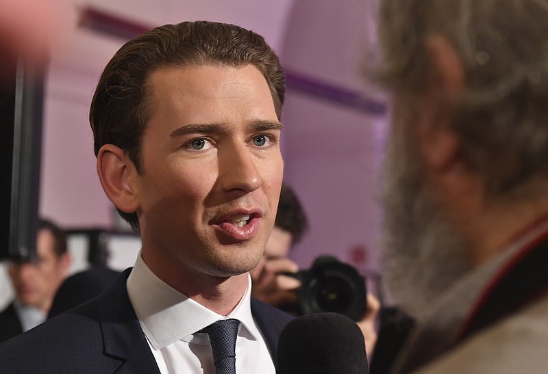
              Foreign Minister Sebastian Kurz, head of Austrian People's Party, gives an interview in Vienna, Austria, Sunday, Oct. 15, 2017, after the closing of the polling stations for the Austrian national elections. (AP Photo/Kerstin Joensson)
            