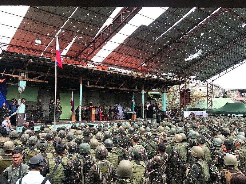 
              Philippine President Rodrigo Duterte talks to troops in Marawi, southern Philippines on Tuesday Oct. 17, 2017. Duterte has declared the southern city of Marawi liberated though the military continues to battle a dwindling band of Muslim militants. (AP Photo/Bullit Marquez)
            