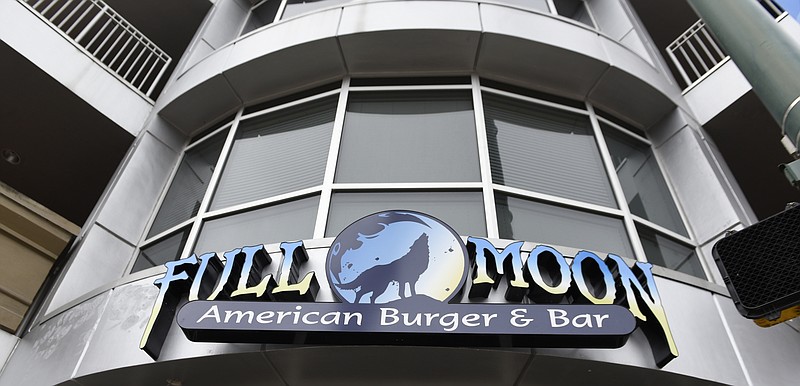 In this Sunday, Jan. 10, 2016, staff file photo, the sign for Full Moon American Burger and Bar is shown at the intersection of Cherokee Boulevard and North Market Street in Chattanooga.