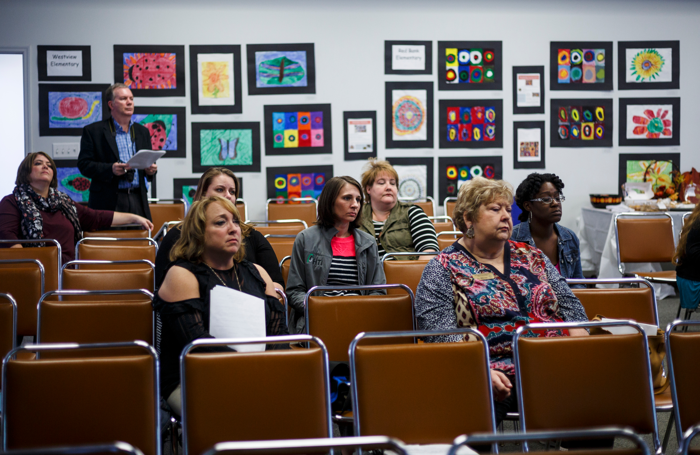 People listen as Hamilton County Schools superintendent Bryan Johnson gives a "State of Our Schools" address to the Hamilton County Council of PTAs in the Hamilton County Department of Education board room on Wednesday, Oct. 18, 2017, in Chattanooga, Tenn.