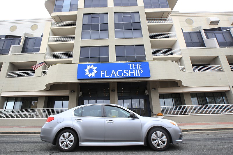 A vehicle drives in front of the Flagship Resort in Atlantic City, N.J. The resort offers timeshares space for its guests. (AP Photo/Julio Cortez)