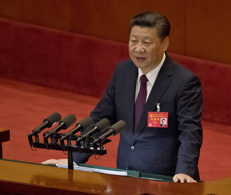 Chinese President Xi Jinping delivers a speech at the opening ceremony of the 19th Party Congress held at the Great Hall of the People in Beijing, China, Wednesday, Oct. 18, 2017. Having bested his rivals, Xi is primed to consolidate his already considerable power as the ruling Communist Party begins its twice-a-decade national congress on Wednesday. (AP Photo/Ng Han Guan)