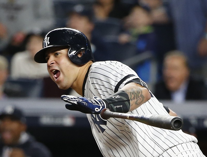 New York Yankees' Gary Sanchez reacts after hitting an RBI single during the fifth inning of Game 5 of baseball's American League Championship Series against the Houston Astros Wednesday, Oct. 18, 2017, in New York. (AP Photo/Kathy Willens)