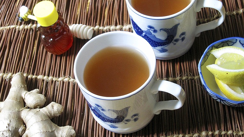 This Oct. 12, 2017 photo shows homemade ginger tea in New York. This drink is from a recipe by Sara Moulton. (Sara Moulton via AP)