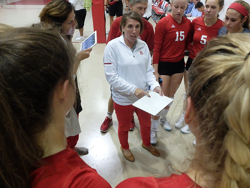 Baylor volleyball coach Sarah Lail talks to her team during the match with GPS Wednesday night at home.