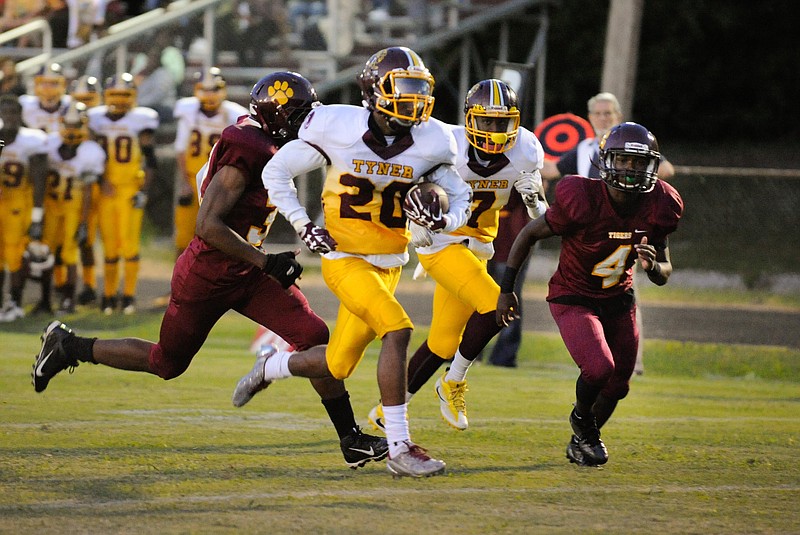 (Photo by Mark Gilliland) Tyner's Jeremy Elston runs for a touchdown during the second quarter in the game against Howard on September 8, 20