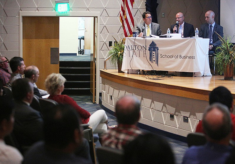 Director of Strategic Operations and Safety Wes Lanier, Director of Business Development John Petrino and Terminal Manager for the Appalachian Regional Port Wesley Barrell speak to guests during a presentation about the Appalachian Regional Port Thursday, Oct. 19, 2017, at Dalton State College's Goodroe Auditorium in Dalton, Ga. The Appalachian Regional Port is a Georgia Ports Authority facility that will be an inland port, located on 42 acres in Murray County. 