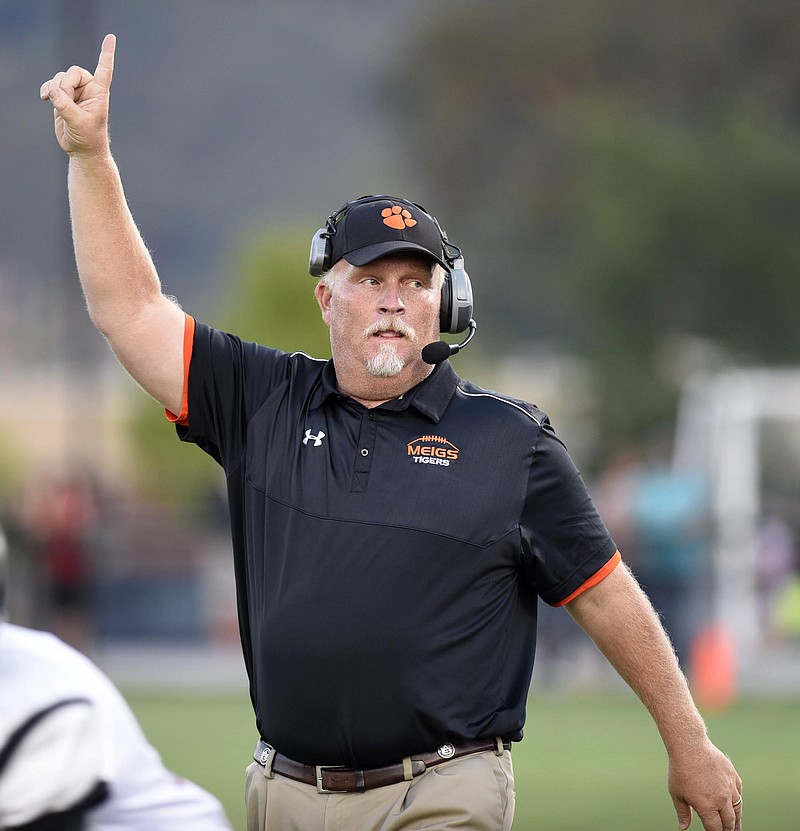 Meigs County head coach Jason Fitzgerald calls for a one-point conversion after a Tiger touchdown.  The Meigs County Tigers visited the Silverdale Baptist Academy Seahawks in TSSAA football action on September 16, 2016. 