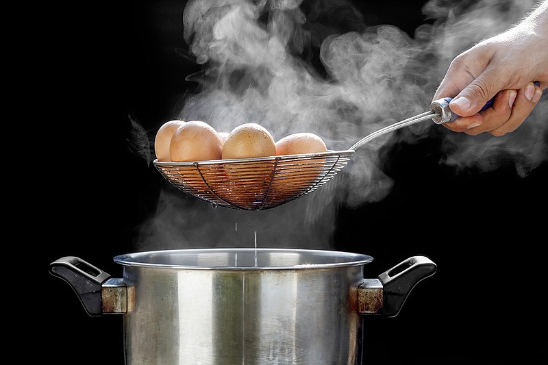 boiling eggs in stainless steel pot