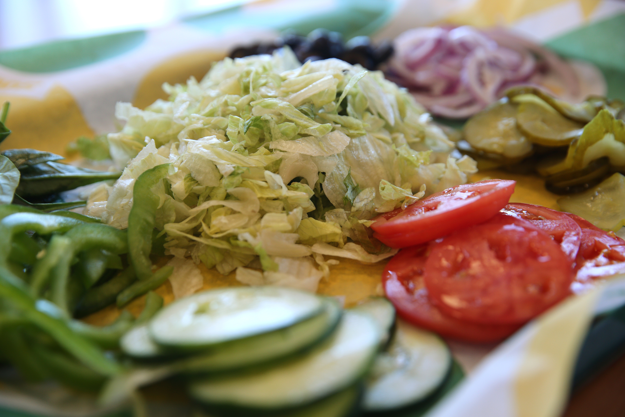 Vegetables sit out on a platter for kids to use to build a healthy sandwich during a Dynamic Dietetics workshop Monday, Oct. 16, 2017, at Subway in Cleveland, Tenn. Kids were able to make Subway sandwiches as Dynamic Dietetics dietitians explained how to make better food choices to children and their parents attending the classes.