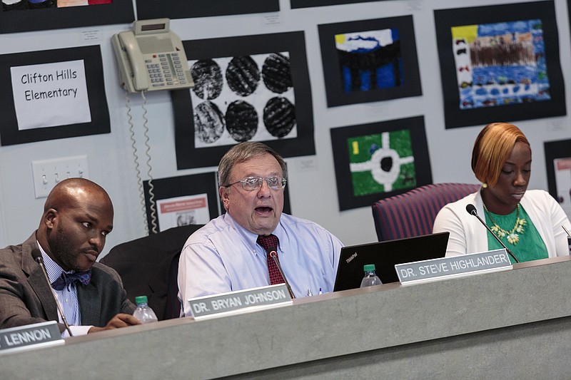 In this July 2017 staff file photo, Hamilton County Schools Superintendent Bryan Johnson, left, and board members Steve Highlander, center, and Karista Mosely Jones take part in a Hamilton County Board of Education meeting.