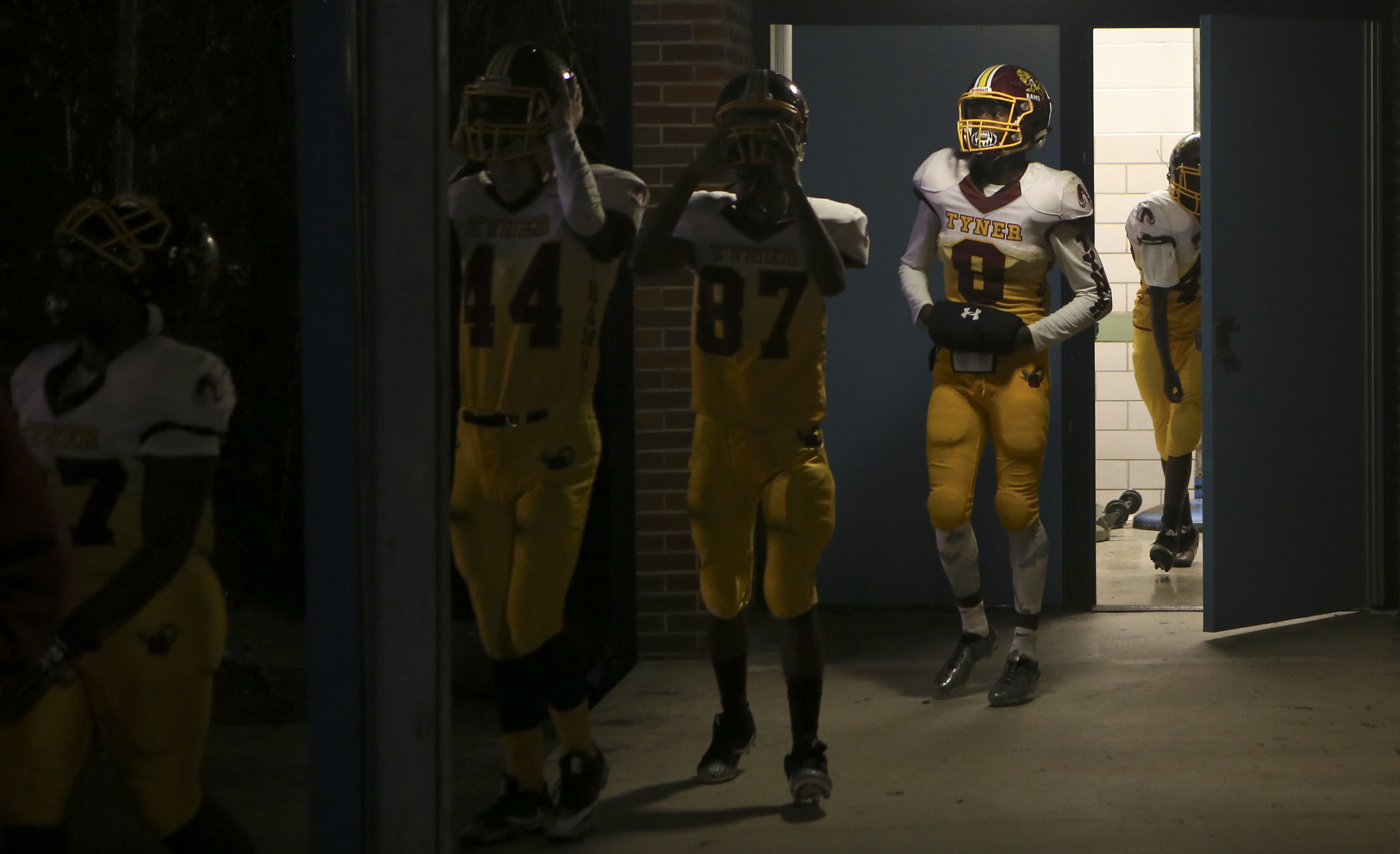 Jaylen Bowens (8) and the Tyner Rams make their way from the locker room for the second half of their game against the Brainerd Panthers at Brainerd High School on Friday, Oct. 20, in Chattanooga, Tenn.