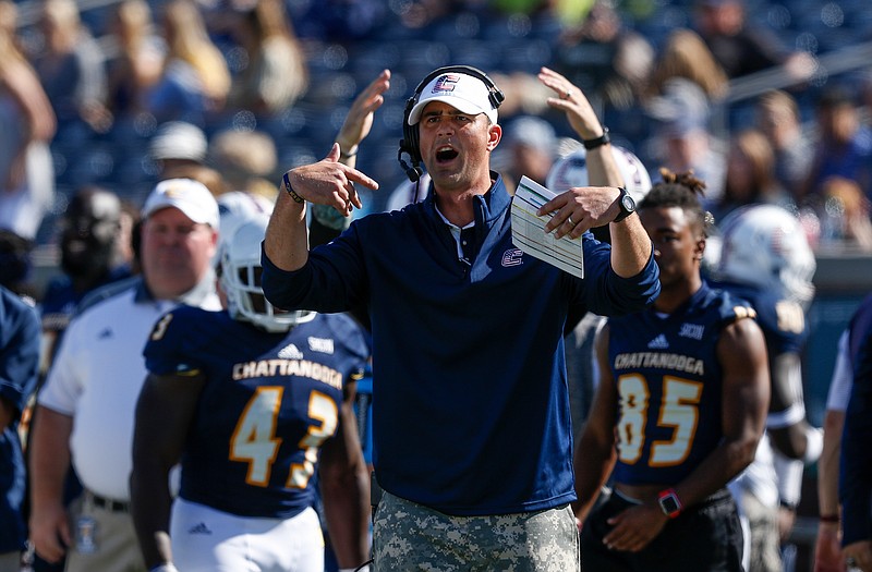 UTC head football coach Tom Arth shouts to players during the Mocs' home football game against the Citadel Bulldogs at Finley Stadium on Saturday, Oct. 21, 2017, in Chattanooga, Tenn.
