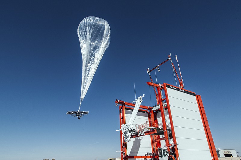 This Wednesday, Oct. 18, 2017 photo provided by Project Loon shows a stratospheric balloon taking off for Puerto Rico from the project site in Winnemucca, Nev. Google's parent Alphabet Inc. said Friday that its stratospheric balloons are now delivering the internet to remote areas of Puerto Rico where cellphone towers were knocked out by Hurricane Maria. Two of the search giant's "Project Loon" balloons are already over the country enabling texts, emails and basic web access to AT&T customers with handsets that use its 4G LTE network. (Project Loon via AP)