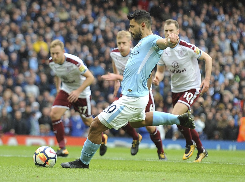 
              Manchester City's Sergio Aguero scores from the penalty spot during the English Premier League soccer match between Manchester City and Burnley at Etihad stadium, Manchester, England, Saturday, Oct. 21, 2017. (AP Photo/Rui Vieira)
            