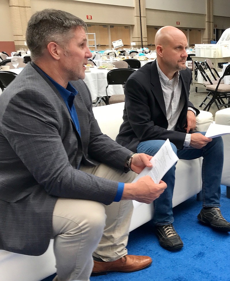 IMSA co-founders Frank Fenner and Corey Ranslem, from left, talk about their maritime data company, which won the CHATech Early Innovators Award.