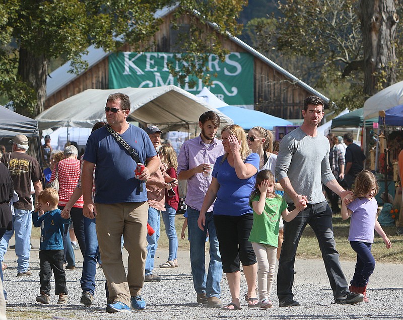 The 40th annual Ketner's Mill Country Arts Fair brings crowds to Whitwell, Tenn., Sunday, Oct. 22, 2017. Each year more than 150 artisans show off their work through products and demonstrations at the two-day festival. 