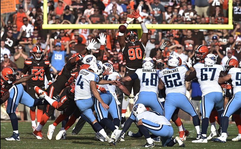 Tennessee Titans kicker Ryan Succop (4) kicks a winning 47-yard field goal in overtime of an NFL football game against the Cleveland Browns, Sunday, Oct. 22, 2017, in Cleveland. (AP Photo/David Richard)

