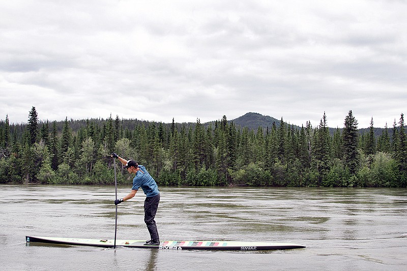 Ben Friberg has logged thousands of miles paddling around the world. Here, he paddles in the Alaskan wilderness.