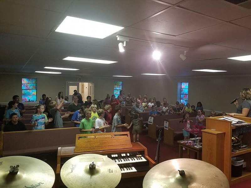 Kids 4 Christ offers food for the body and soul at its weekly praise sessions. (Contributed photo)