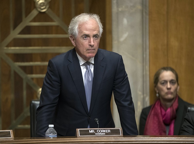 Senate Foreign Relations Committee Chairman Bob Corker, R-Tenn., pauses during a hearing before being asked by reporters about derisive exchange of name-calling with President Donald Trump, on Capitol Hill in Washington, Tuesday. In a remarkable Republican war of words, Corker says Trump is "utterly untruthful" and debases the nation. Then the president fires back that the two-term lawmaker "couldn't get elected dog catcher." (AP Photo/J. Scott Applewhite)