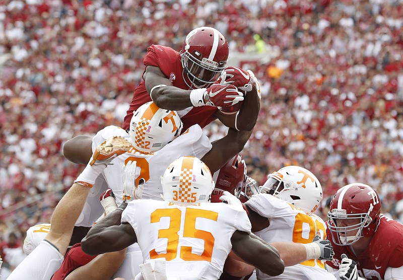 Alabama running back Bo Scarbrough had two leaping touchdowns on fourth-and-goal from the 1-yard line last Saturday during the 45-7 win over Tennessee.