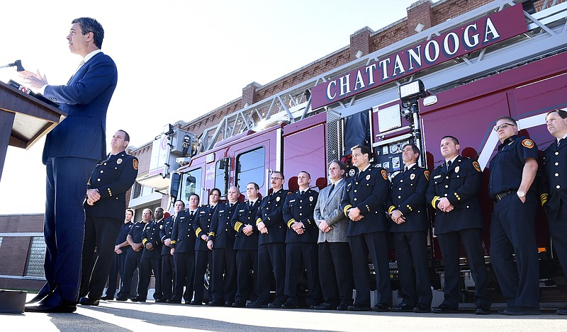 Mayor Andy Berke speaks to the media as Fire Chief Phil Hyman and other personal listen. During a press conference, on October 26, 2017, at Fire Station 1, on East Main Street, the Chattanooga Fire Department announced that it has been upgraded from a Class 2 to a Class 1 public Protection Classification. October 26, 2017.