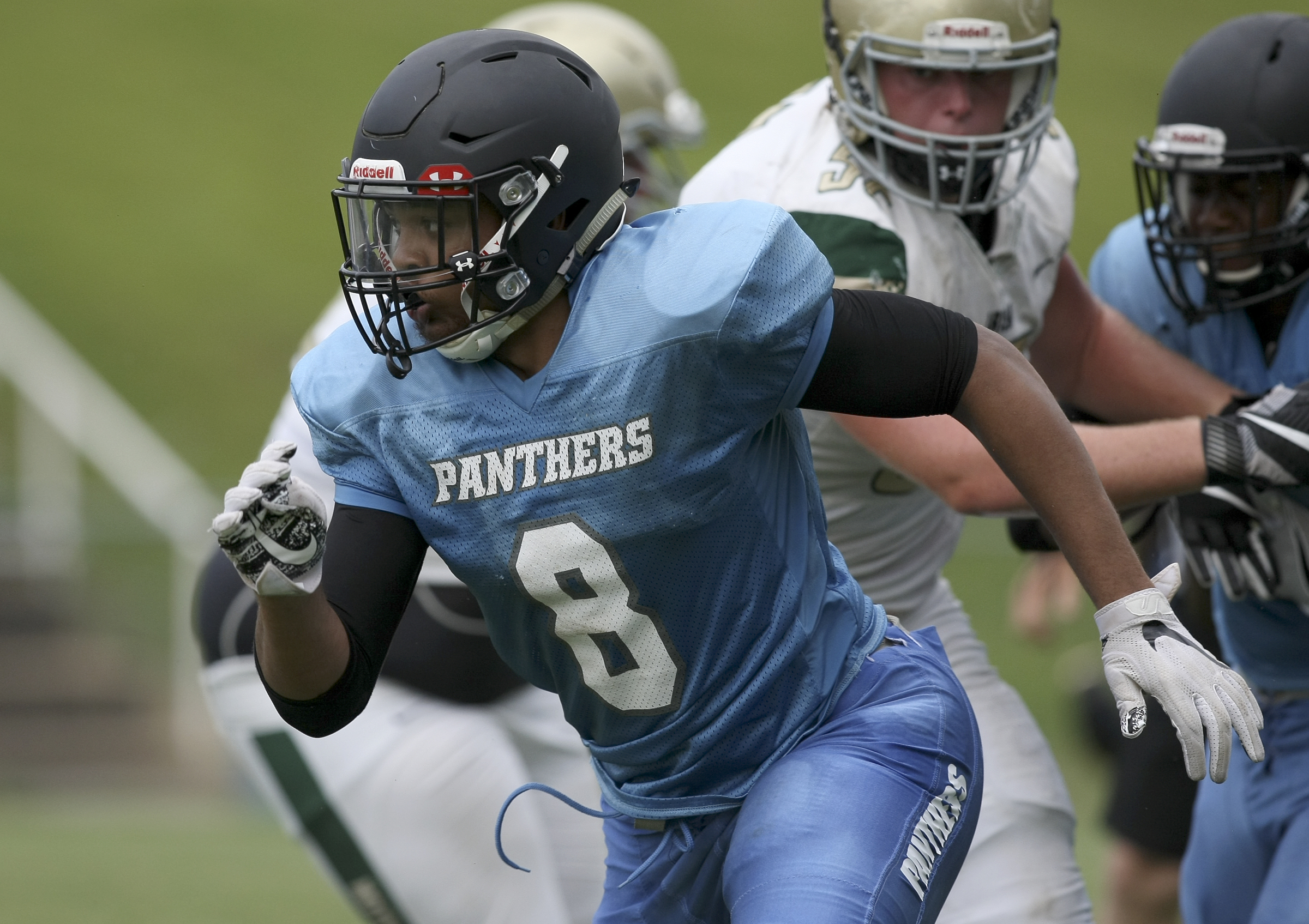 Brainerd's Jesse Walker breaks towards the ball carrier during a scrimmage against Notre Dame at Central High School's Central Memorial Stadium on Tuesday, Aug. 1, in Harrison, Tenn.