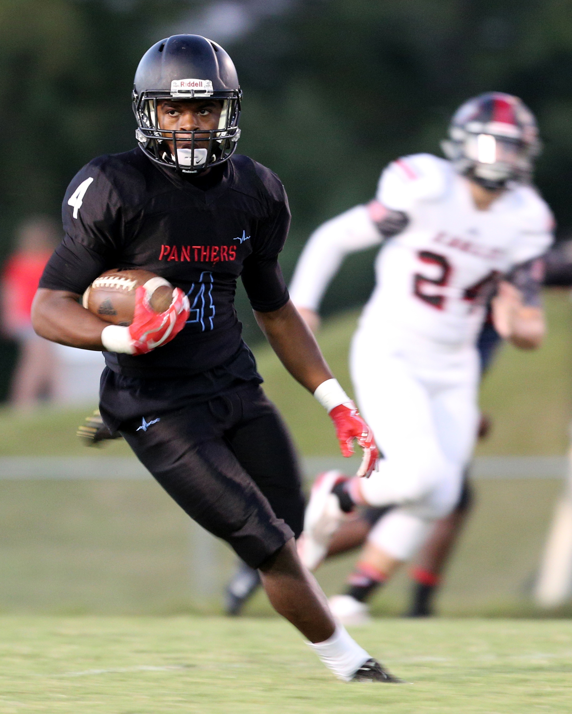 Brainerd wide receiver Jailen Wofford (4) runs the ball downfield during the Signal Mountain High School vs. Brainerd High School football game at Brainerd High School Friday, Sept 29, 2017.