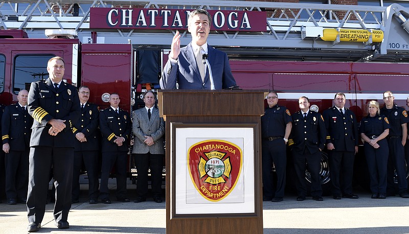 Mayor Andy Berke speaks to the media as Fire Chief Phil Hyman and other personal listen.  During a press conference, on October 26, 2017, at Fire Station 1, on East Main Street, the Chattanooga Fire Department announced that it has been upgraded from a Class 2 to a Class 1 public Protection Classification. October 26, 2017.