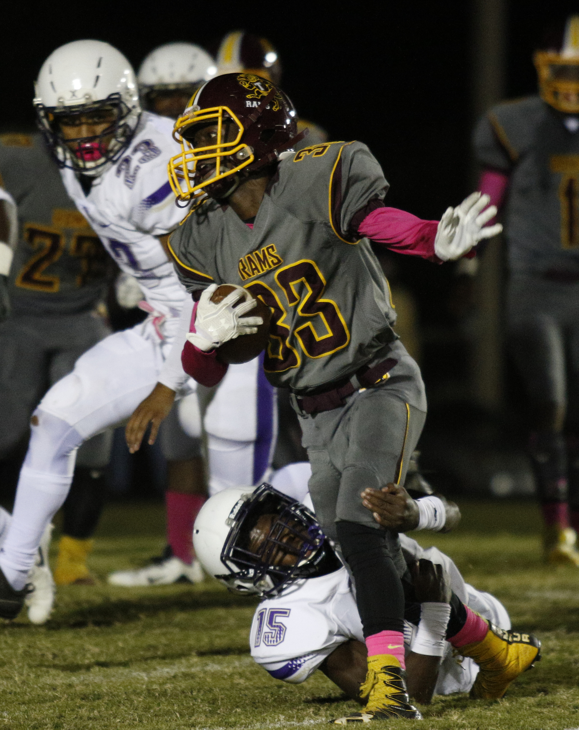 Centralճ Jacobi Witcher (15) tackles Tynerճ Jerome Stoudemire (33) during their prep football game at Tyner High School on Friday, Oct. 27, 2017, in Chattanooga, Tenn.