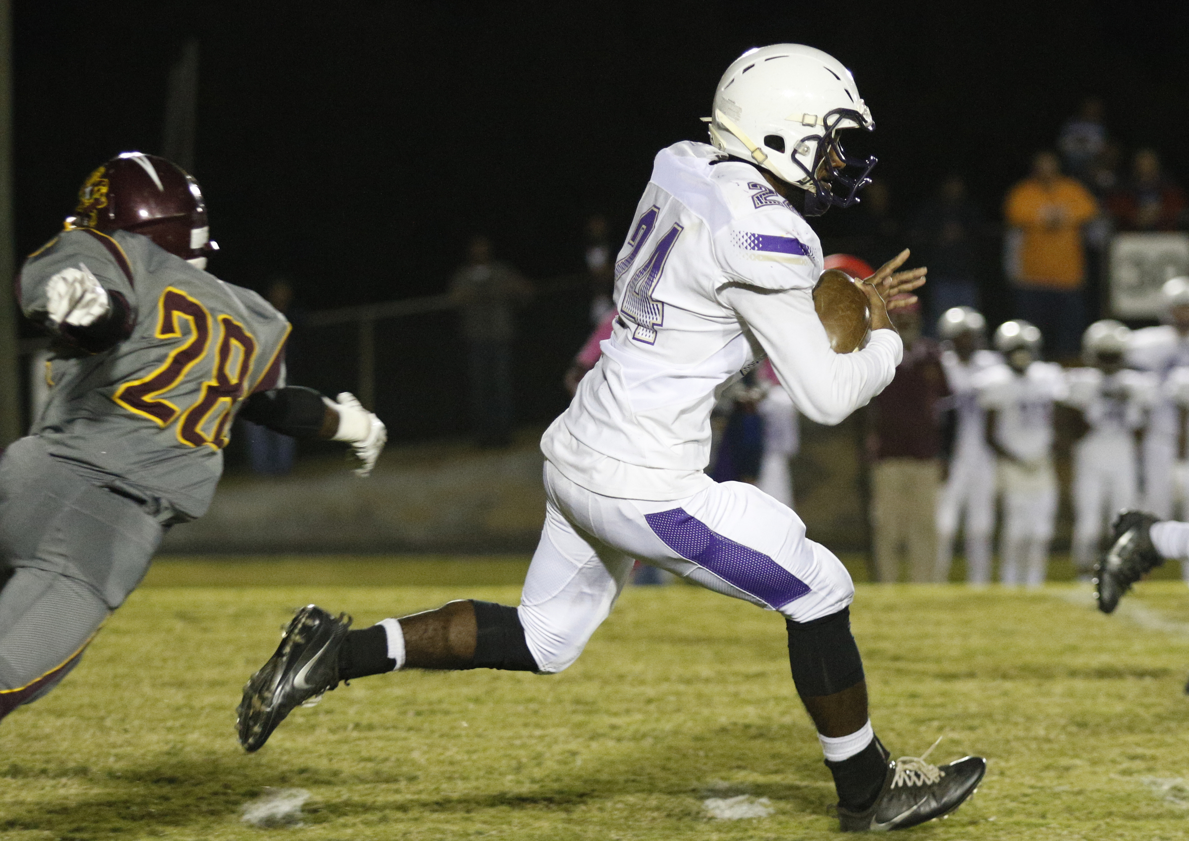 Centralճ DonYa Parker (24) breaks around Tynerճ Jevon Anderson (28) during their prep football game at Tyner High School on Friday, Oct. 27, 2017, in Chattanooga, Tenn.