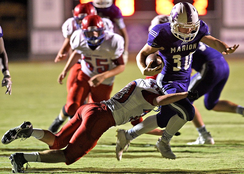 Marion's Seth McClain (30) is stopped just short of the goalline.  The Polk County Wildcats visited the Marion County Warriors in TSSAA football action on October 27, 2017. 