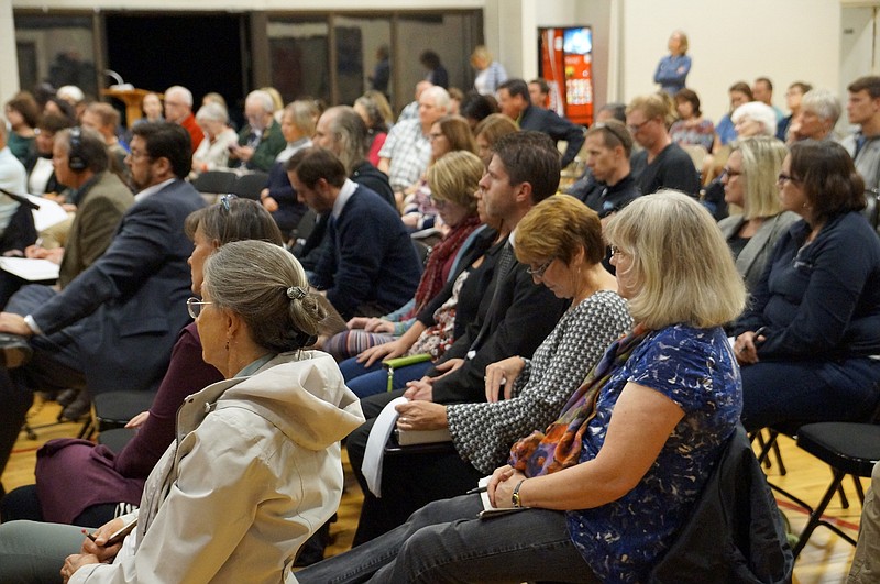 Community members listen as SSVC members describe the findings detailed in their final report during a public presentation Oct. 18. The committee is holding another such meeting in the Signal Mountain Town Hall gymnasium Nov. 6. (Staff photo by Myron Madden)