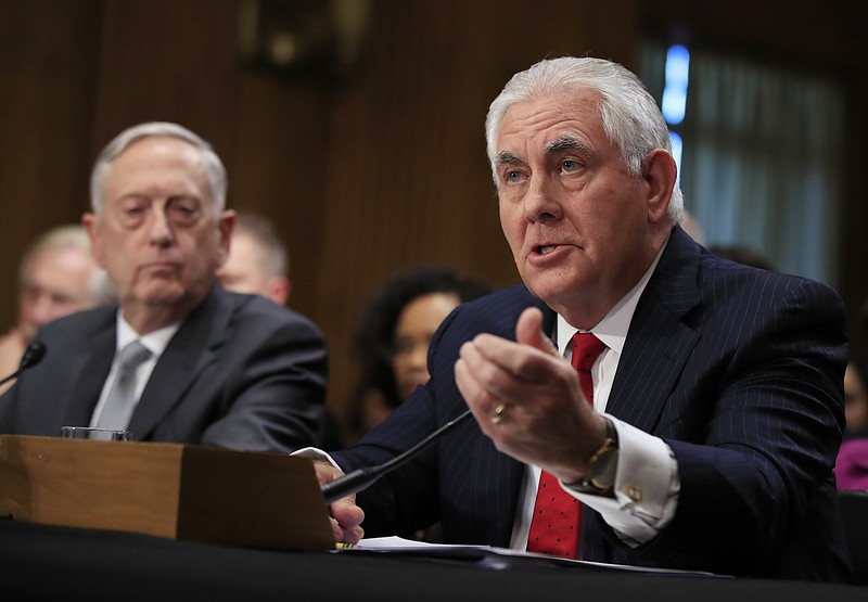 Secretary of State Rex Tillerson, right, with Secretary of Defense Jim Mattis, testifies during a Senate Foreign Relations Committee hearing on "The Authorizations for the Use of Military Force: Administration Perspective" on Capitol Hill in Washington, Monday, Oct. 30, 2017. (AP Photo/Manuel Balce Ceneta)