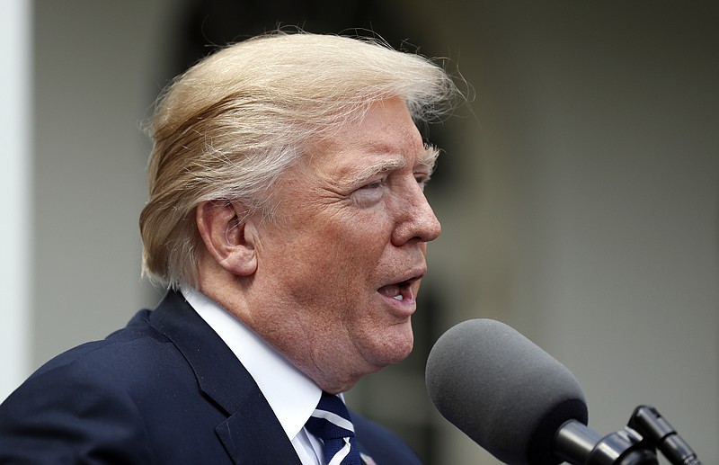 President Donald Trump speaks in the Rose Garden after meeting with Senate Majority Leader Mitch McConnell, R-Ky., at the White House, Monday, Oct. 16, 2017, in Washington. (AP Photo/Alex Brandon)