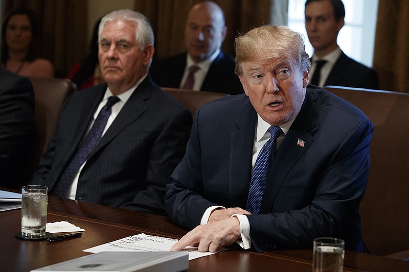 Secretary of State Rex Tillerson listens as President Donald Trump speaks during a cabinet meeting at the White House, Wednesday, Nov. 1, 2017, in Washington. (AP Photo/Evan Vucci)