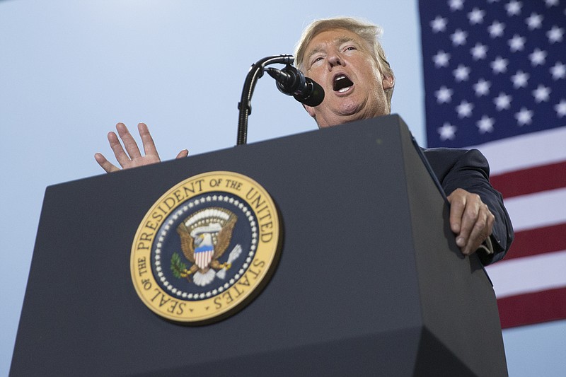President Donald Trump delivers an address on tax policy in Middletown, Pa., earlier this month. The GOP tax plan would repeal the Johnson Amendment and allow churches to play politics. (Tom Brenner/The New York Times)