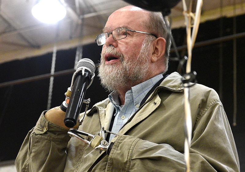 Panelist Father Michael Lapsley speaks to the students.  The Second Annual State of our Children was held at Orchard Knob Middle School on October 26, 2017.