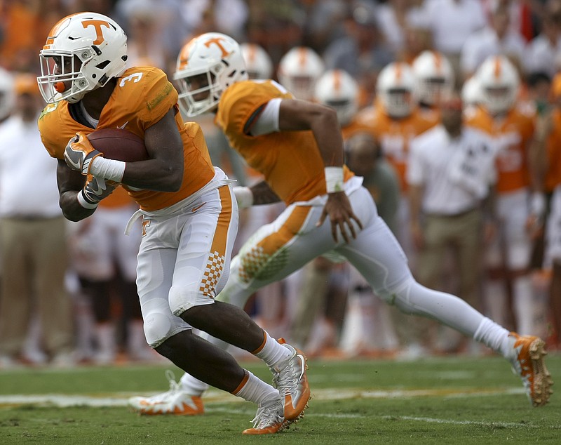 Tennessee running back Ty Chandler runs for a short gain during last month's home game against South Carolina. He rushed for 120 yards and two touchdowns with starter John Kelly suspended for last Saturday's game at Kentucky.