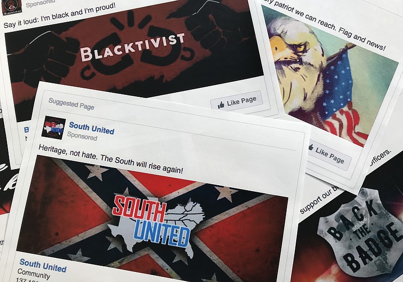 Some of the Facebook ads linked to a Russian effort to disrupt the American political process and stir up tensions around divisive social issues, released by members of the U.S. House Intelligence committee, are photographed in Washington, on Wednesday, Nov. 1, 2017. The ads, dozens of which were disclosed for the first time, were released as representatives of leading social media companies faced criticism on Capitol Hill about why they hadn't done more to combat Russian interference on their sites and prevent foreign agents from meddling in last year's election. (AP Photo/Jon Elswick)