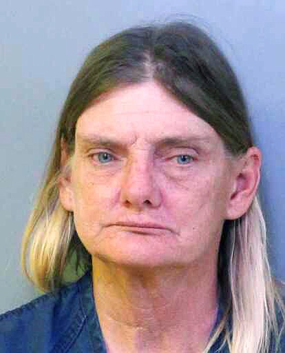 This undated booking photo made available by the Polk County Sheriff's Office shows Donna Byrne, of Lakeland, Fla. Law enforcement officials charged Bryne with driving under the influence while riding a horse down a busy Florida highway on Thursday, Nov. 2, 2017. She was also charged with animal neglect for endangering and failing to provide proper protection for the horse.(Polk County Sheriff's Office via AP)
