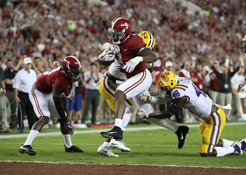 Alabama running back Bo Scarbrough had a 9-yard touchdown run early in the second quarter to give the Crimson Tide a 14-0 lead in their eventual 24-10 win over LSU on Saturday night in Tuscaloosa.