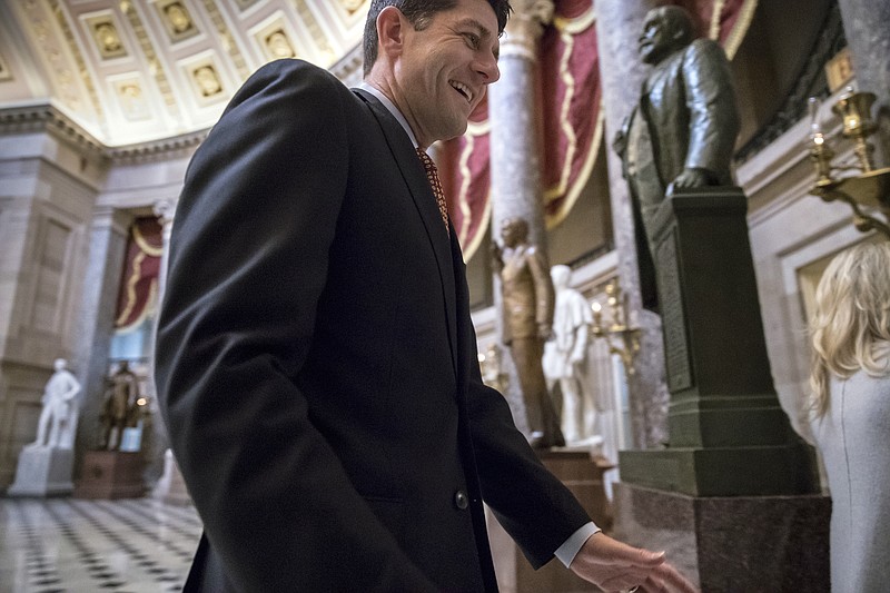 House Speaker Paul Ryan, R-Wis., walks through Statuary Hall to his office on Capitol Hill in Washington, Friday, Nov. 3, 2017. Ryan introduced a far-reaching tax overhaul Thursday that will be a priority for the GOP. (AP Photo/J. Scott Applewhite)