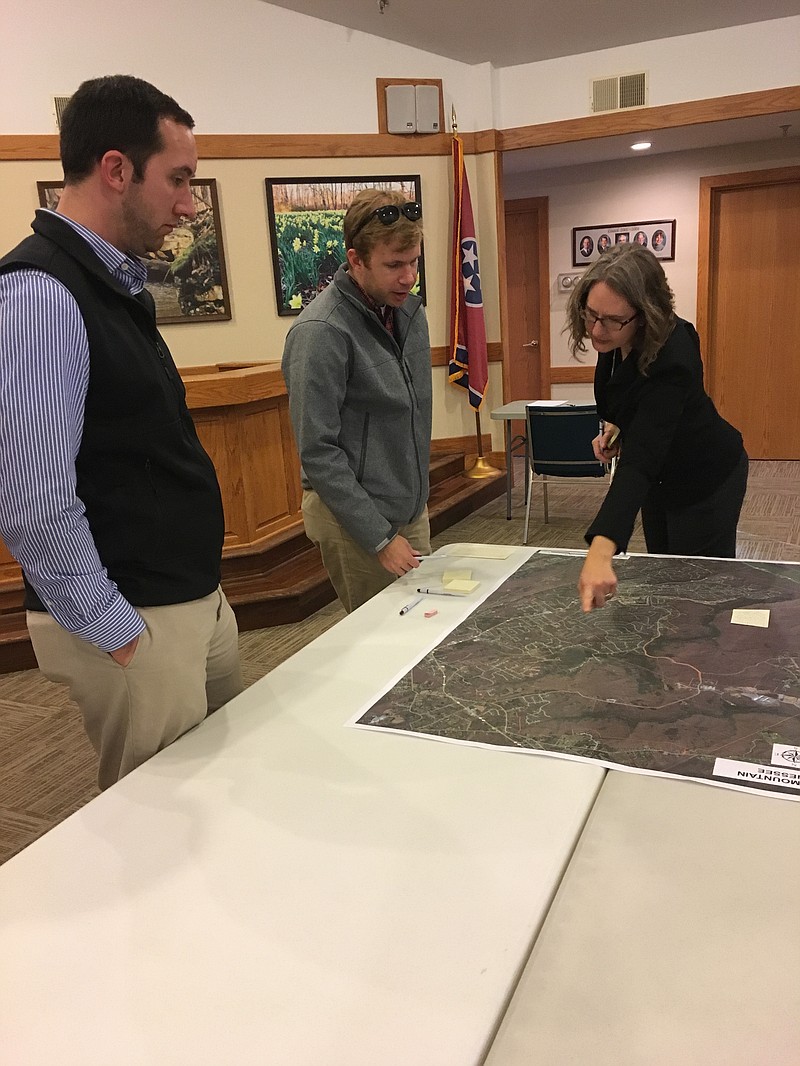 Community members examine a map of Signal Mountain as they identify areas for desired walkability during an open house session about alternative transportation infrastructure Oct. 30. (Contributed photo)