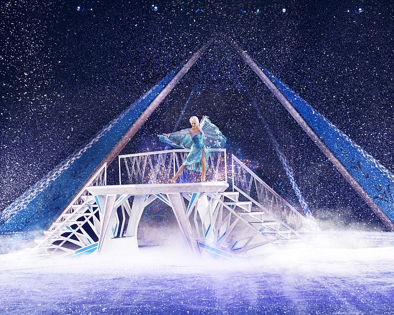 Elsa makes it snow during "Frozen" ice show.
