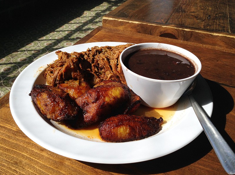 Embargo 62's Ropa Vieja entree with black beans and sweet plantains. (Photo by Chris Zelk)