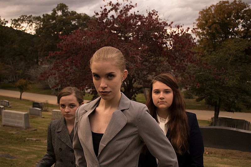 From left are Zoe Kokotek, Alyssa Whitesell and Shania Kennett, who play young girls in the village of Salem who send the community spiraling into darkness through childish finger-pointing.