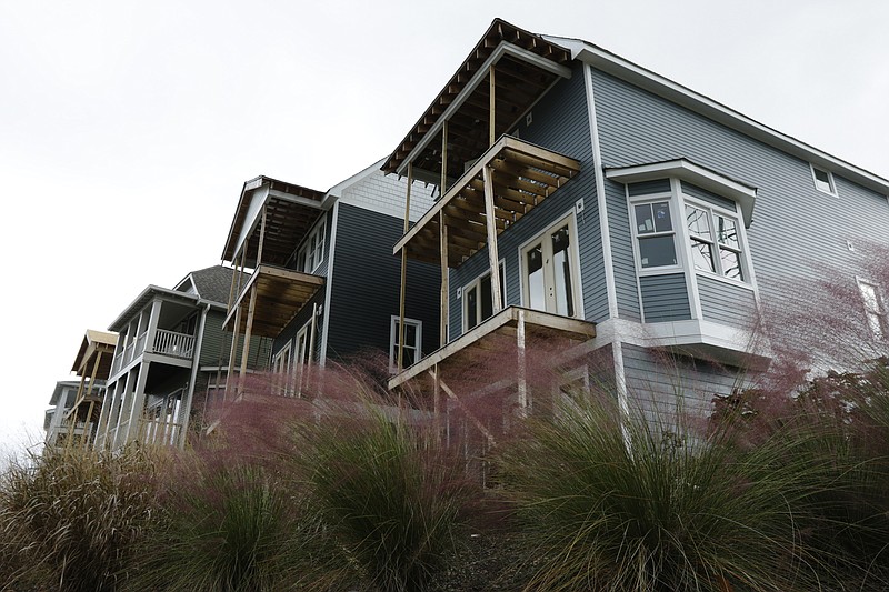 Cameron Harbor homes are under construction near the new Blue Goose Hollow Trailhead of the Tennessee River Park on Tuesday, Nov. 7, 2017, in Chattanooga, Tenn.